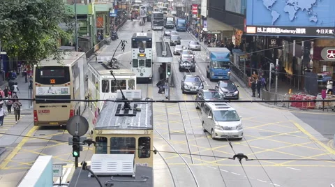 Time Lapse of buses and pedestrians go through a crossing at a street Stock Footage 45407155