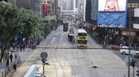 Time Lapse of buses and pedestrians go through a crossing at a street Stock Footage 45407283