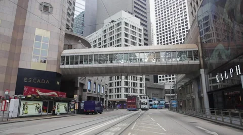Time Lapse of buses driving among the office buildings in Hong Kong Central Stock Footage 45096983