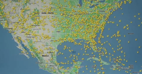 Time lapse of busy air traffic over map on digital screen. Stock Footage 339267922