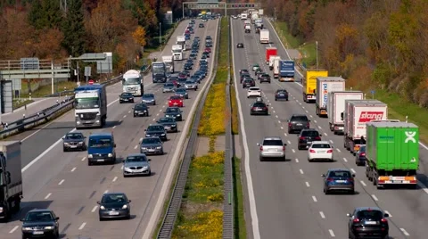 Time lapse of busy and fast car traffic at Autobahn in Germany Stock Footage