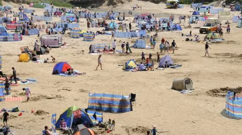 Time lapse of busy beach Stock Footage 21034738