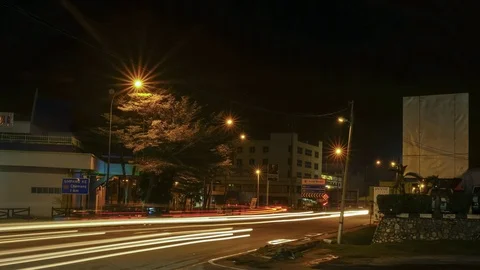 TIME LAPSE BUSY CAR ON ROAD DURING NIGHT WITH LIGHT TRAIL EFFECT Stock Footage