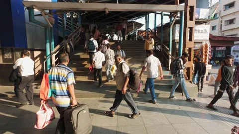 Time lapse of a busy crowd moving at Bandra railway station Stock Footage 318539717