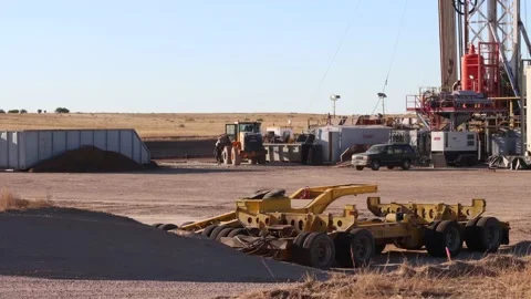 Time lapse of busy fracking site. Tons of movement tractors and trucks. Stock Footage 196292784