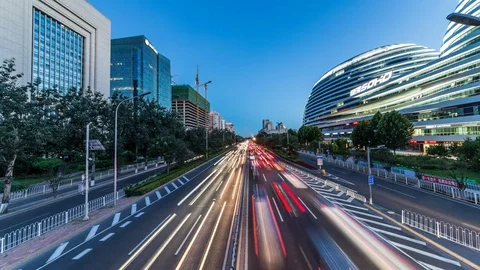 Time lapse of busy freeway traffic from day to night in beijing city，china Vídeos de archivo 78719356