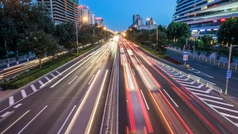 Time lapse of busy freeway traffic from day to night in beijing city，china Stockbeeldmateriaal 78719431