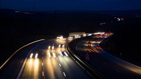 Time lapse of busy freeway traffic on a german autobahn at night Stock Footage 87278947