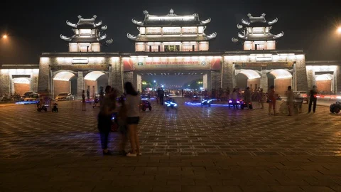 Time Lapse of a Busy Friday Night at the City Gates in Ninh Binh Vietnam Stock Footage 87284387