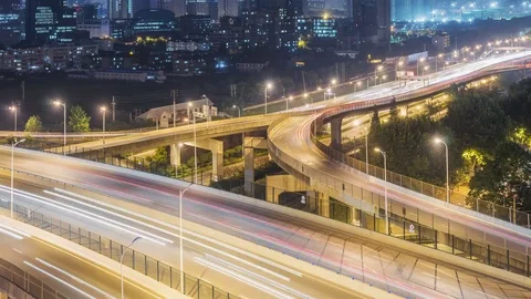Time lapse of the busy interchange traffic at night in city 스톡 동영상 74425895