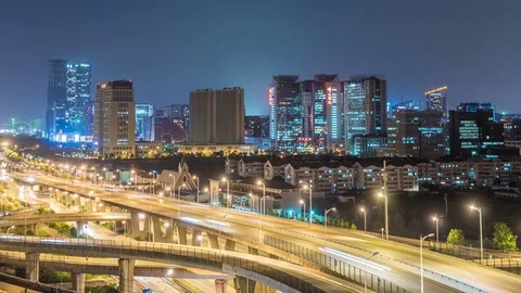 Time lapse of the busy interchange traffic at night in city Stock-Footage 74454552