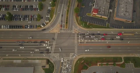 Time lapse of busy intersection form above Stock Footage 98527748