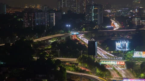 Time lapse busy night intersection traffic on a Highway of Kuala Lumpur Video stock 115078971