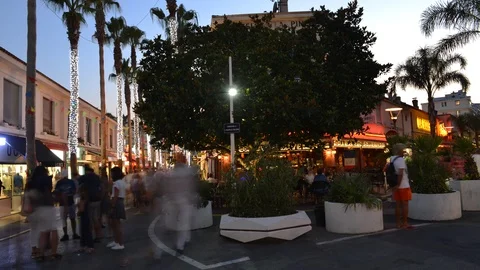 Time lapse of busy pedestrian area in Juan les Pins, Cote d'Azur, France Stock Footage 91965014