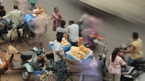 Time Lapse of Busy Street with Bread Vendors and Traffic, Goa, India. Stock Footage 21219486
