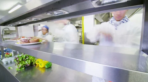 Time lapse of a busy team of chefs preparing food ready for service Stock-Footage 31872748