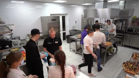 Time lapse of busy team of chefs preparing food in a restaurant  kitchen Video stock 149964645