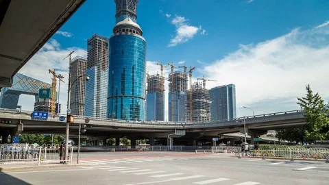 Time lapse of busy traffic and modern buildings in Beijing city , China. Stock Footage 78714400