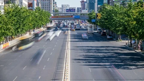 Time lapse of busy traffic and modern buildings in Beijing city , China. Stock Footage 78718563