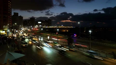 Time lapse of busy traffic on corniche road at night in Alexandria Egypt Stock Footage 151323463