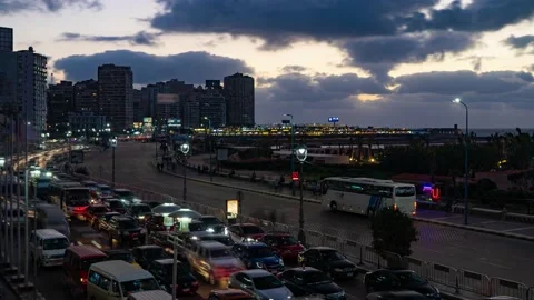 Time lapse of busy traffic on corniche road at sunset in Alexandria Egypt Stock Footage 151323470