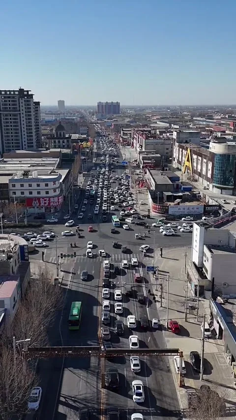 Time-lapse of Busy Traffic at a Major City Intersection in China Stock Footage 330143188