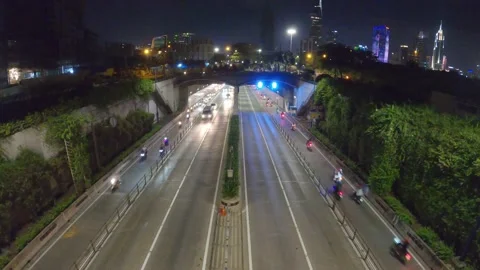 Time lapse busy traffic in Thu Thiem tunnel exit Stock Footage 158428658