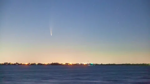 Time lapse of C/2020 F3, Comet Neowise, in the early morning sky Stock Footage