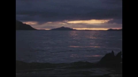 Time-lapse of calm sea during sunset - 1976 Stock Footage 89320556