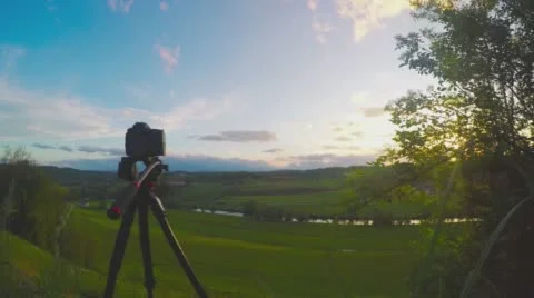 Time lapse of camera filming time lapse of sunset and clouds Stock Footage 63079048