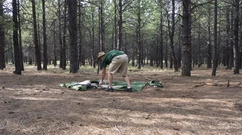 Time lapse of a camper setting up a tent Stock Footage 65431180