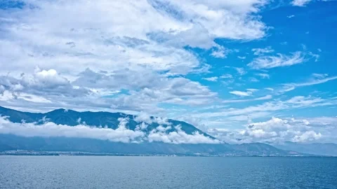 Time-lapse of Cangshan Mountain and Erhai Lake in Dali, Yunnan Stock Footage 295611595