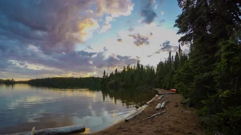 A time-lapse of a canoe by a lake Stock Footage 137610472
