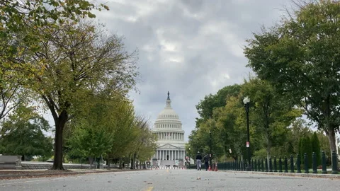 Time lapse of Capitol Building and tourists stree view Stock Footage 142329230