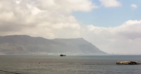 Time Lapse capturing a helicopter practice in Simonstown, South Africa Video stock 300159543