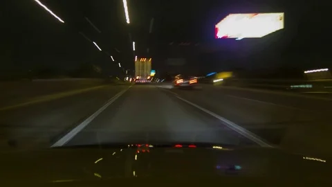 A time lapse of a car driving on the highway at night 動画素材 88488015