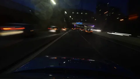 Time lapse car driving through leeds city centre at twilight united kingdom Stock Footage 73004993