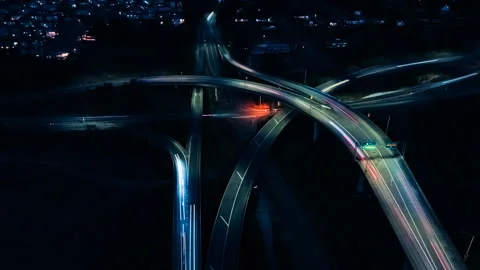 Time lapse of car headlights in motion on the highway as the sun sets Stock Footage 264193193