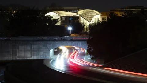 Time lapse of car light streaks and the Institute of Peace in Washington D. C. Stock Footage 237465991