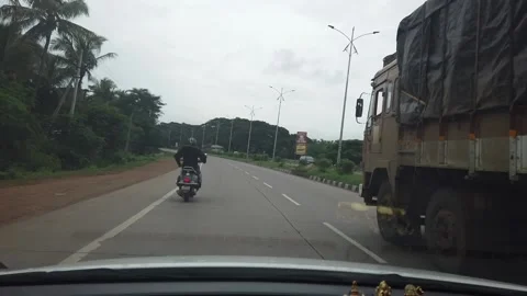 Time lapse of car over taking into traffic in Indian highway Stock Footage 138496781