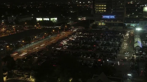Time lapse of a car park night scene  in a Southeast Asian city Stock Footage 69105594