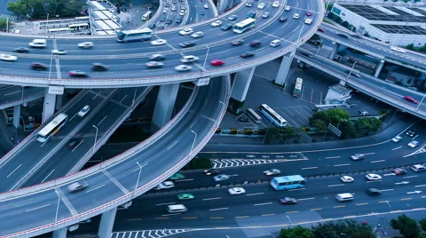 Time lapse: car running fast on a spiral bridge Stock Footage 55214757