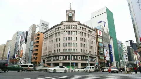 Time-lapse: car traffic and Pedestrians cross the road at Ginza , Tokyo, Japan Stock Footage 153589257