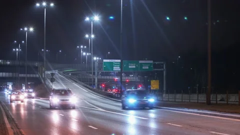 Time lapse car traffic interchange road in evening, modern roadway intersection Stock Footage 169324845