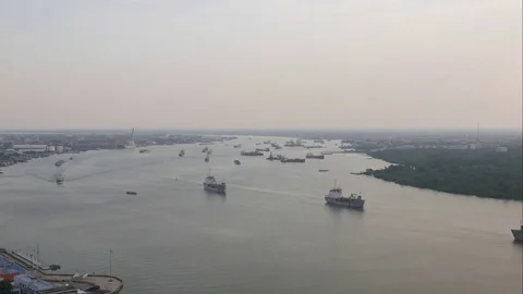 Time-lapse Cargo transport ship passing industrial port area in river. Stock Footage 84269533