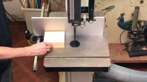 Time lapse of carpenter cutting a piece of wood Stock Footage 111997726