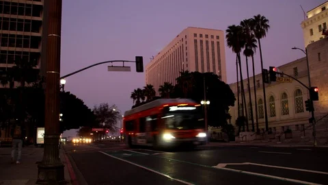 Time Lapse Of Cars And Buses Moving Through Los Angeles At Sunset Stock Footage