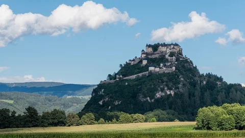 Time Lapse - Castle with a corn field in front and moving clouds above 스톡 동영상 99362481