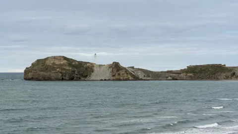 Time-lapse of Castlepoint lighthouse, Castlepoint, Wellington, New Zealand. Stock Footage 135306210