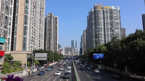Time lapse. The Central district of the city. Cars drive on a wide road 스톡 동영상 145807620
